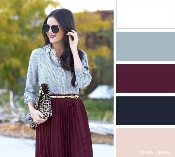 Chica con atuendo en colores blanco, bordeaux, azul grisáceo y marino.